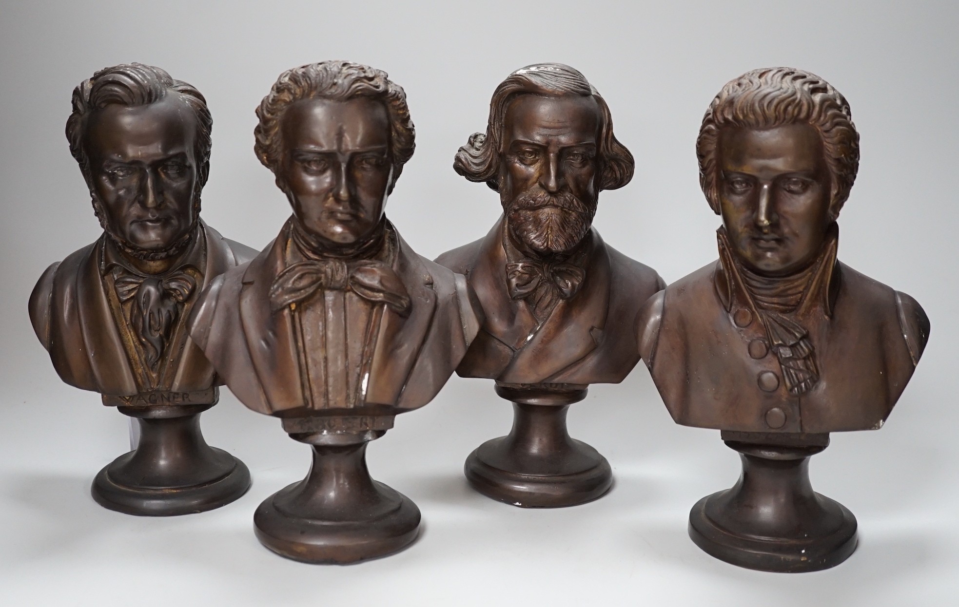 A set of four bronze busts of composers: Schubert, Wagner, Verdi and Mozart, 14cm high